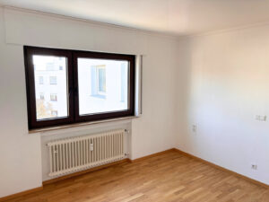 Schlafzimmer mit Parkettboden